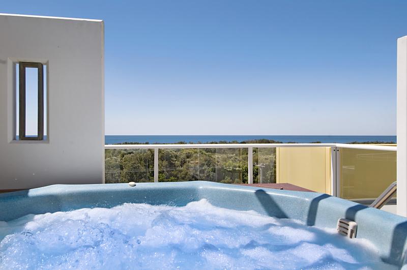 Relax in your private heated plunge pool and spa at Seachange Coolum